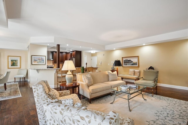 1512 Larimer St Unit 39, Denver, CO 80202 - living room featuring dark wood-style flooring, baseboards, and recessed lighting