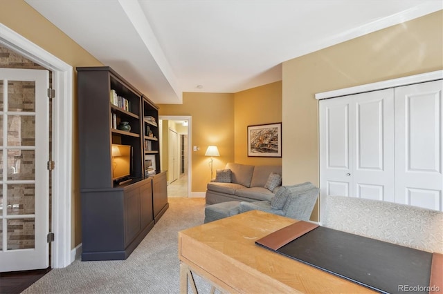 1512 Larimer St Unit 39, Denver, CO 80202 - living room featuring light carpet and baseboards