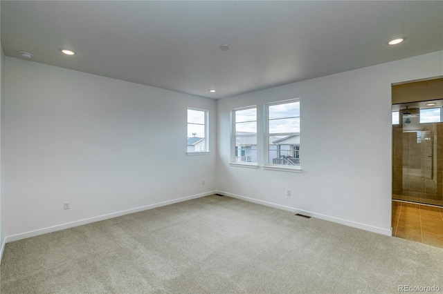 23909 E 41st Ave, Aurora, CO 80019 - carpeted empty room featuring baseboards and recessed lighting
