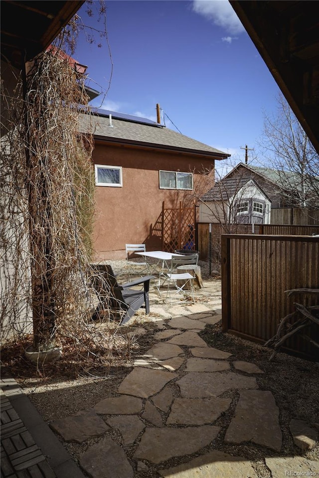 view of patio / terrace with fence