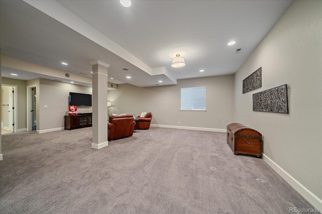 basement featuring recessed lighting, baseboards, and carpet