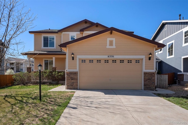 6370 Twilight Ave, Firestone, CO 80504 - craftsman house with stone siding, concrete driveway, and a garage
