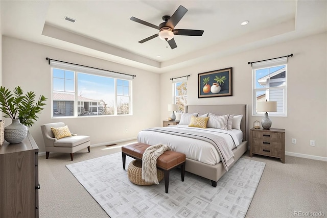 6370 Twilight Ave, Firestone, CO 80504 - bedroom with a raised ceiling, light carpet, baseboards, and a ceiling fan