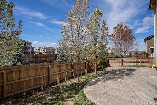 6370 Twilight Ave, Firestone, CO 80504 - fenced backyard featuring a patio