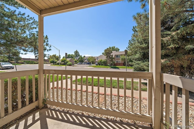 1970 S Xanadu Way Unit 101, Aurora, CO 80014 - porch featuring a residential view
