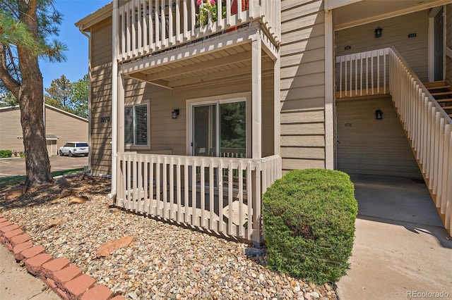 1970 S Xanadu Way Unit 101, Aurora, CO 80014 - view of exterior entry featuring a balcony