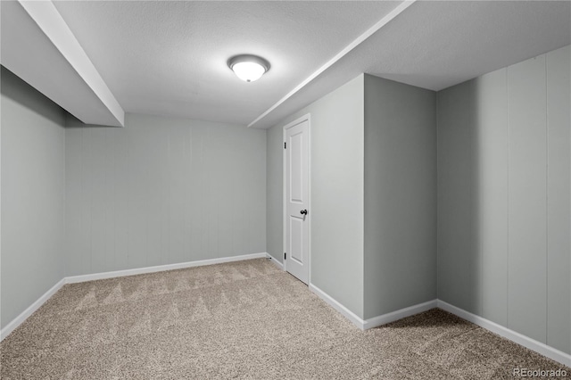 1765 S Endicott St, Lakewood, CO 80232 - empty room with carpet, baseboards, and a textured ceiling