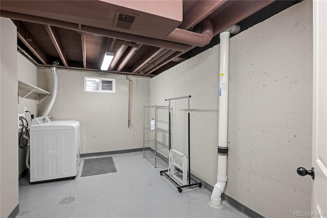 1765 S Endicott St, Lakewood, CO 80232 - basement with washing machine and dryer and baseboards