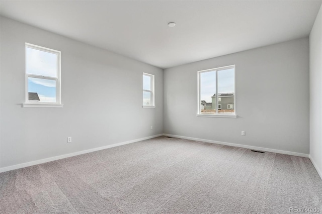 empty room with carpet floors