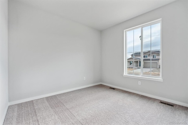 view of carpeted spare room