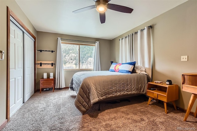 bedroom with carpet, baseboards, a closet, and ceiling fan