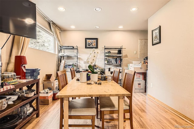 dining room featuring light wood-style floors and recessed lighting
