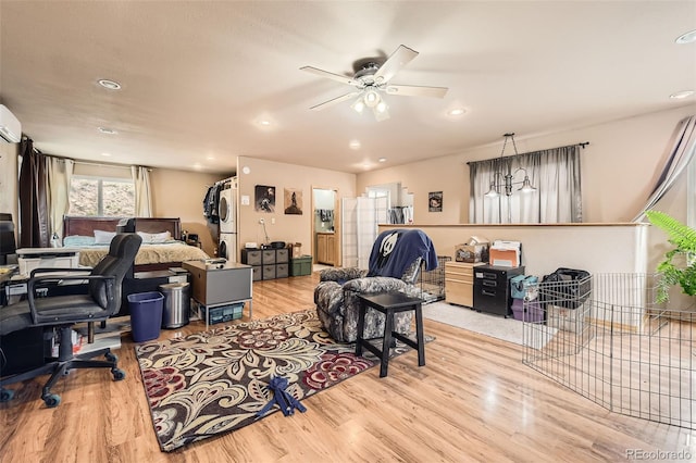 living room featuring wood finished floors, ceiling fan, a desk, and recessed lighting
