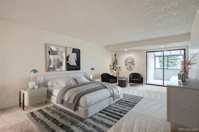 7000 E Quincy Ave Unit 317, Denver, CO 80237 - bedroom with carpet flooring, access to exterior, and a textured ceiling