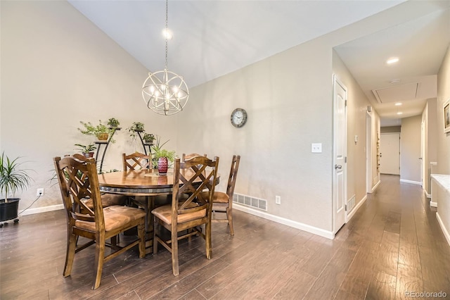 12668 W 1st Pl Unit 81, Denver, CO 80228 - dining room with attic access, dark wood-type flooring, baseboards, a chandelier, and lofted ceiling