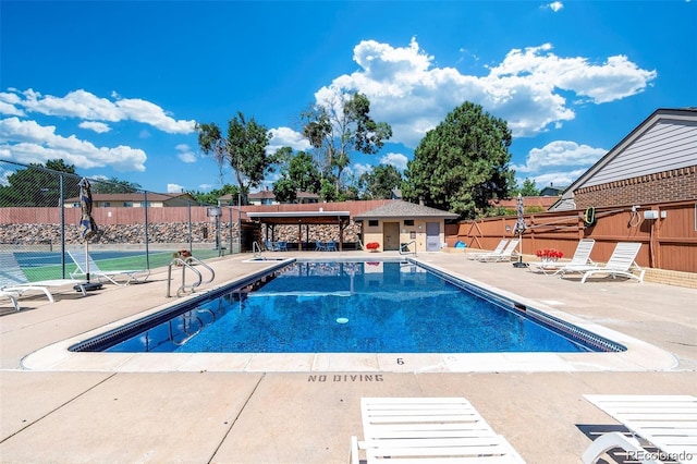 12668 W 1st Pl Unit 81, Denver, CO 80228 - community pool featuring a patio