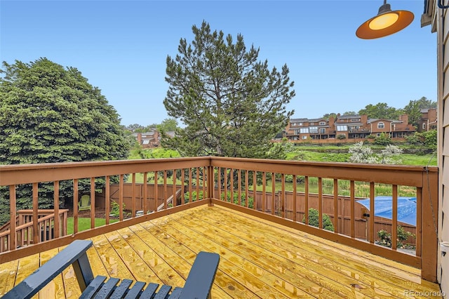 12668 W 1st Pl Unit 81, Denver, CO 80228 - wooden deck with a residential view