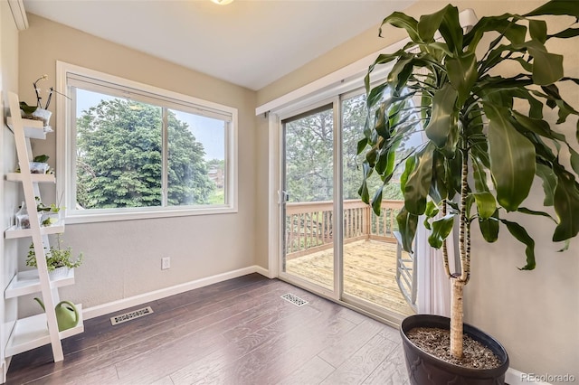 12668 W 1st Pl Unit 81, Denver, CO 80228 - entryway with baseboards and wood finished floors