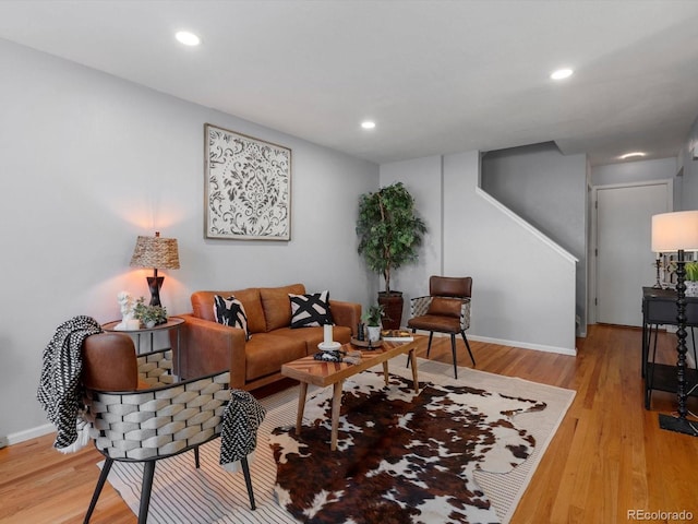 1714 W 102nd Ave, Thornton, CO 80260 - living area with light wood-style flooring and recessed lighting