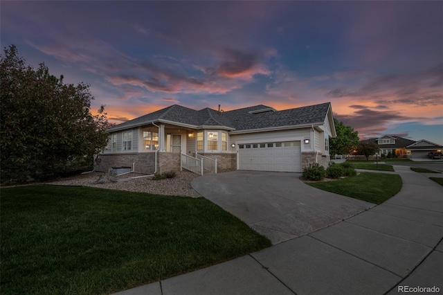 8258 S Sicily Ct, Aurora, CO 80016 - ranch-style home with a porch, a yard, a garage, concrete driveway, and a shingled roof