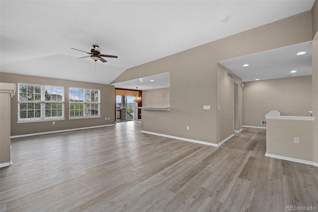 8258 S Sicily Ct, Aurora, CO 80016 - unfurnished living room featuring a ceiling fan, light wood-style floors, baseboards, vaulted ceiling, and recessed lighting