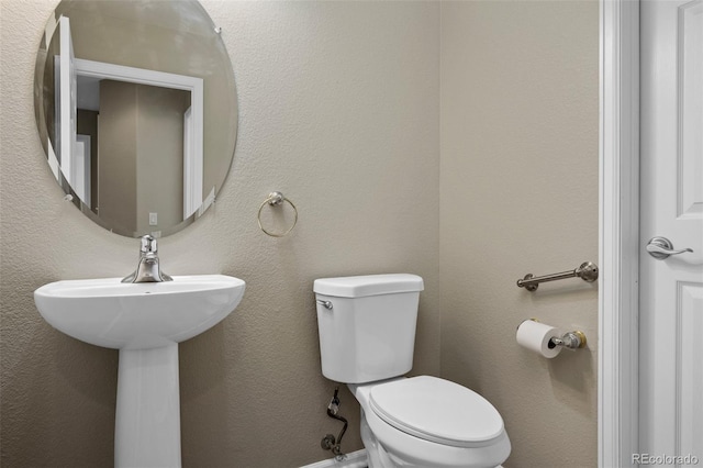 8258 S Sicily Ct, Aurora, CO 80016 - half bathroom with toilet and a sink