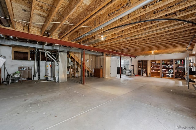 8258 S Sicily Ct, Aurora, CO 80016 - unfinished basement featuring gas water heater and stairs