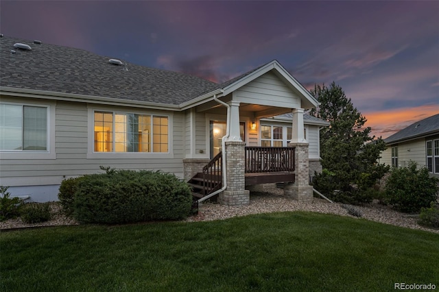 8258 S Sicily Ct, Aurora, CO 80016 - view of front of property featuring a lawn and roof with shingles