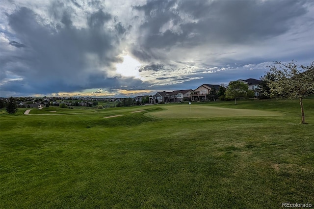 8258 S Sicily Ct, Aurora, CO 80016 - view of property's community featuring a putting area, a lawn, and view of golf course
