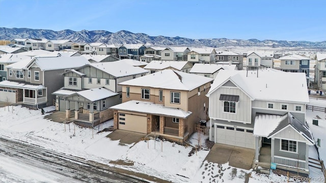 aerial view with a mountain view and a residential view