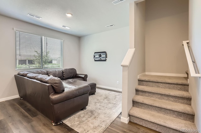 630 Apache Trl Unit D2, Ault, CO 80610 - living area with dark wood-type flooring and stairs