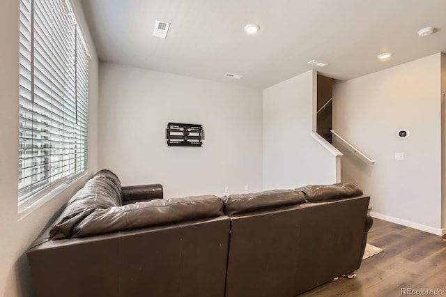 630 Apache Trl Unit D2, Ault, CO 80610 - living room featuring dark wood-style floors, stairs, and recessed lighting