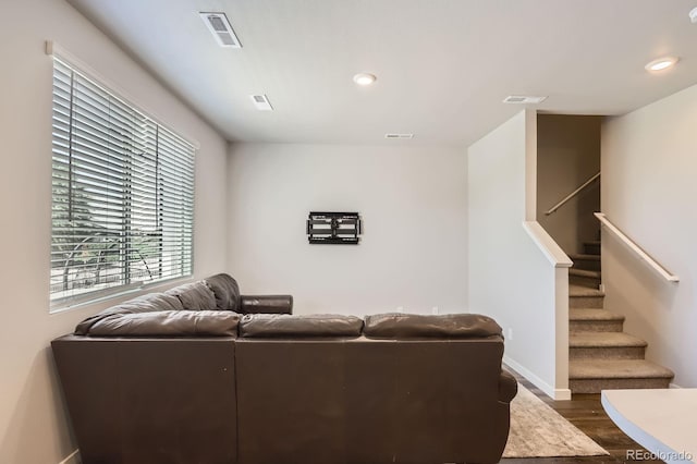 630 Apache Trl Unit D2, Ault, CO 80610 - living room featuring dark wood-style flooring, stairs, and recessed lighting