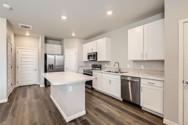 630 Apache Trl Unit D2, Ault, CO 80610 - kitchen with appliances with stainless steel finishes, white cabinets, light countertops, and recessed lighting