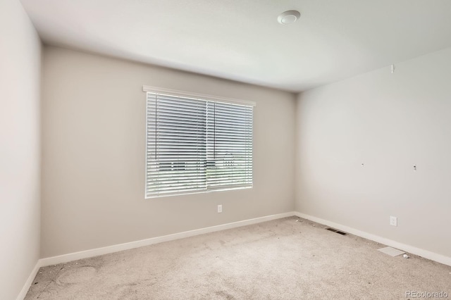 630 Apache Trl Unit D2, Ault, CO 80610 - carpeted empty room featuring baseboards