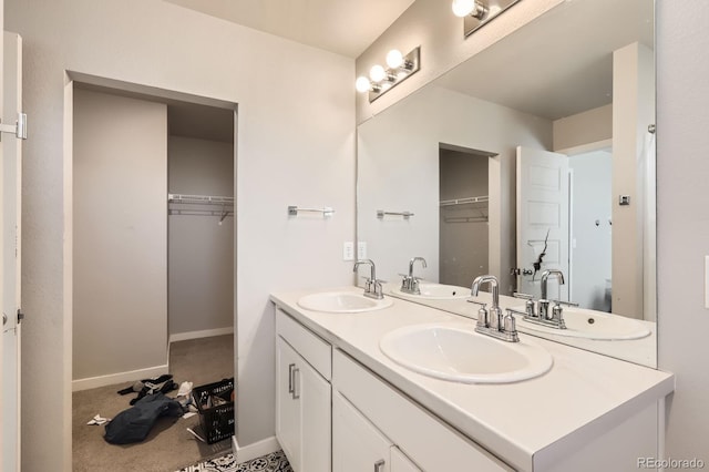 630 Apache Trl Unit D2, Ault, CO 80610 - full bathroom with double vanity and a walk in closet