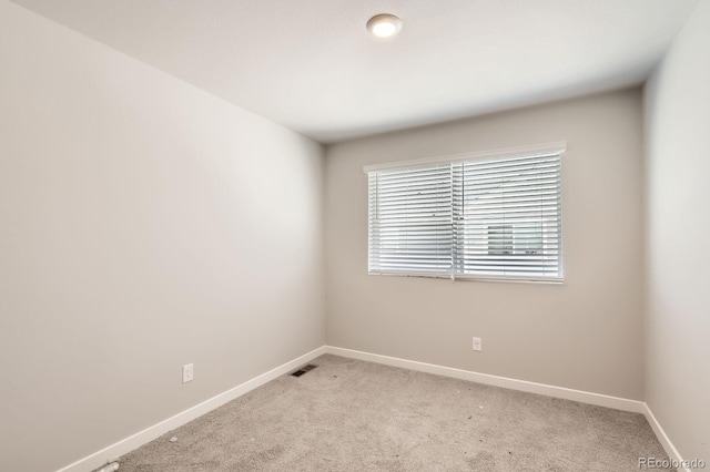 630 Apache Trl Unit D2, Ault, CO 80610 - empty room with baseboards and light colored carpet