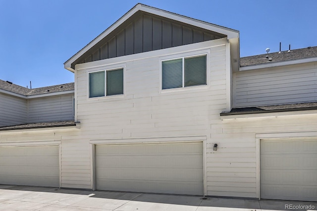 630 Apache Trl Unit D2, Ault, CO 80610 - view of side of property with an attached garage and board and batten siding