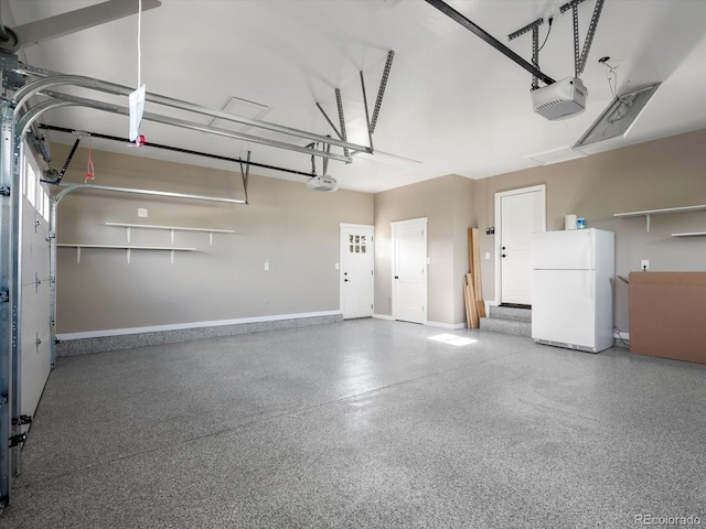 15229 Navajo St, Broomfield, CO 80023 - garage with freestanding refrigerator and a garage door opener