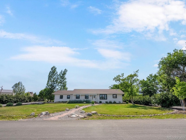 15229 Navajo St, Broomfield, CO 80023 - ranch-style house featuring a front lawn