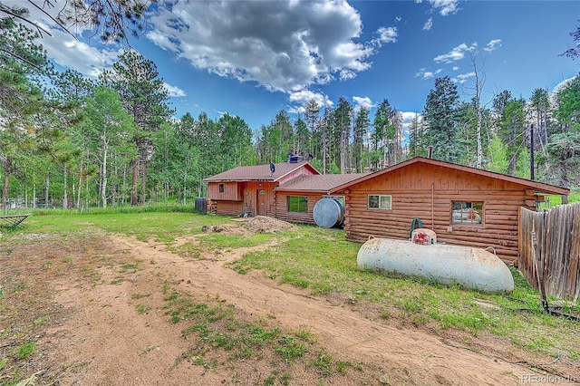 200 Rd P37, Bailey, CO 80421 - back of house featuring log siding and a forest view