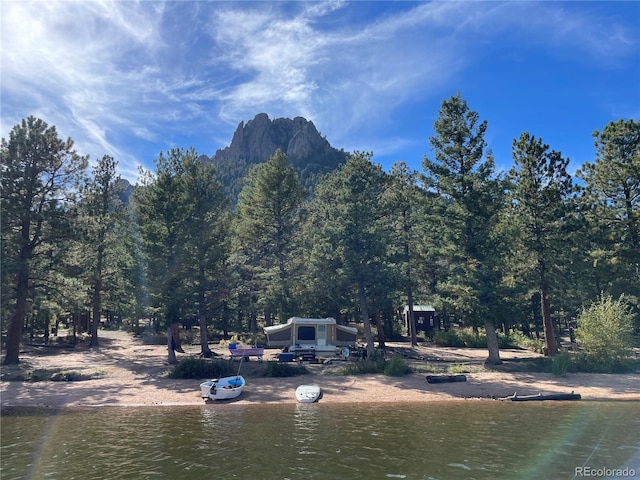 200 Rd P37, Bailey, CO 80421 - water view featuring a heavily wooded area