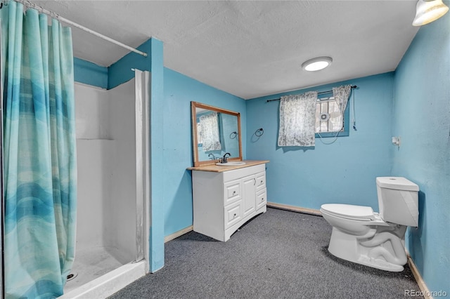 200 Rd P37, Bailey, CO 80421 - bathroom featuring a stall shower, vanity, and a textured ceiling