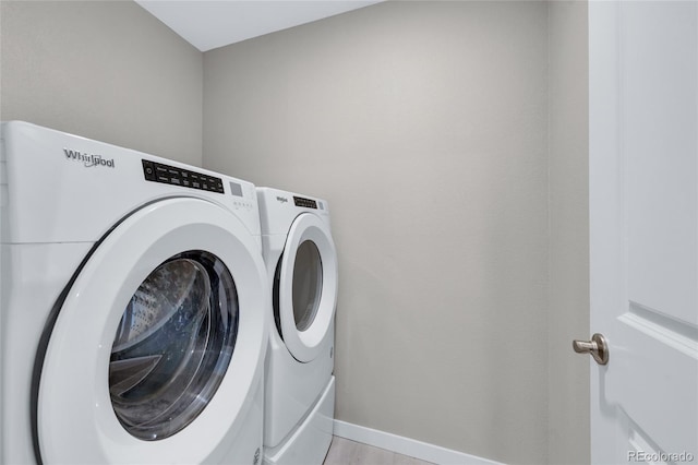 10228 Wrangell Cir, Colorado Springs, CO 80924 - laundry room featuring separate washer and dryer and baseboards