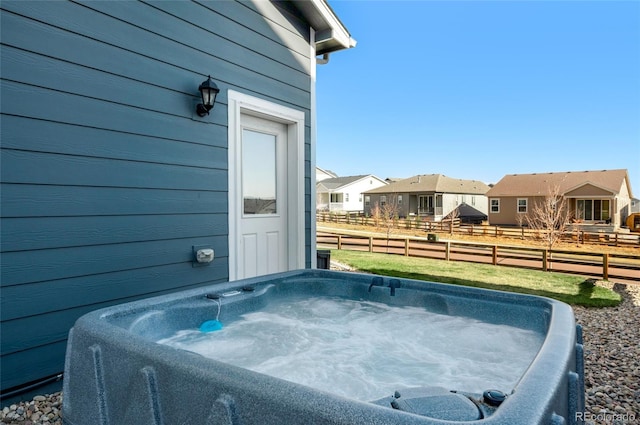 10228 Wrangell Cir, Colorado Springs, CO 80924 - view of patio / terrace featuring a hot tub and a residential view