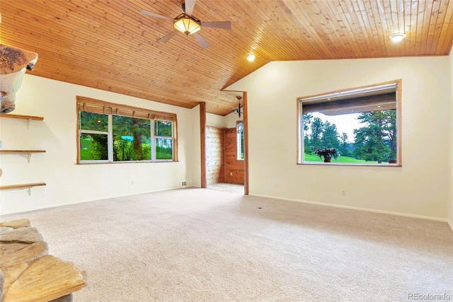 29090 Golf Way, Evergreen, CO 80439 - unfurnished living room with a ceiling fan, lofted ceiling, wooden ceiling, plenty of natural light, and carpet floors