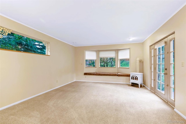 29090 Golf Way, Evergreen, CO 80439 - carpeted empty room featuring crown molding and baseboards