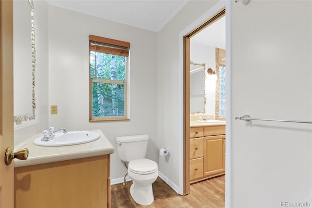 29090 Golf Way, Evergreen, CO 80439 - bathroom featuring vanity and wood finished floors