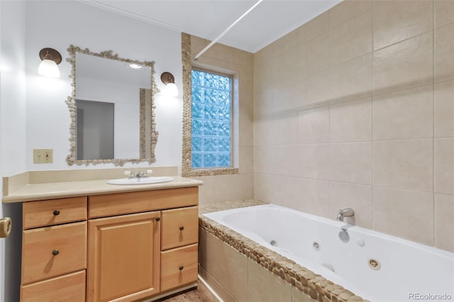 29090 Golf Way, Evergreen, CO 80439 - full bathroom with a whirlpool tub, vanity, and crown molding