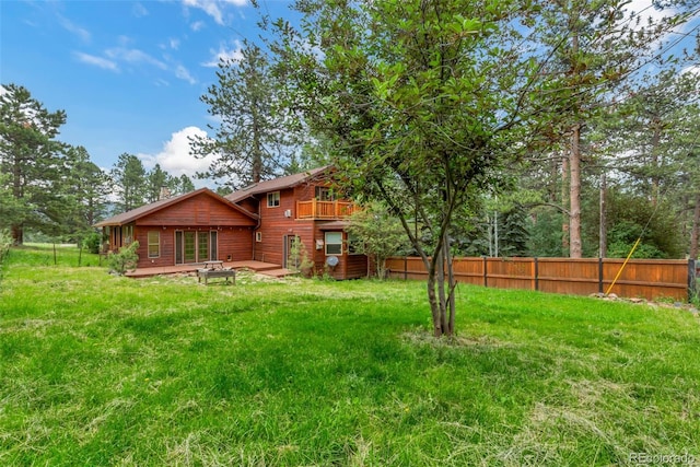 29090 Golf Way, Evergreen, CO 80439 - rear view of house with a wooden deck